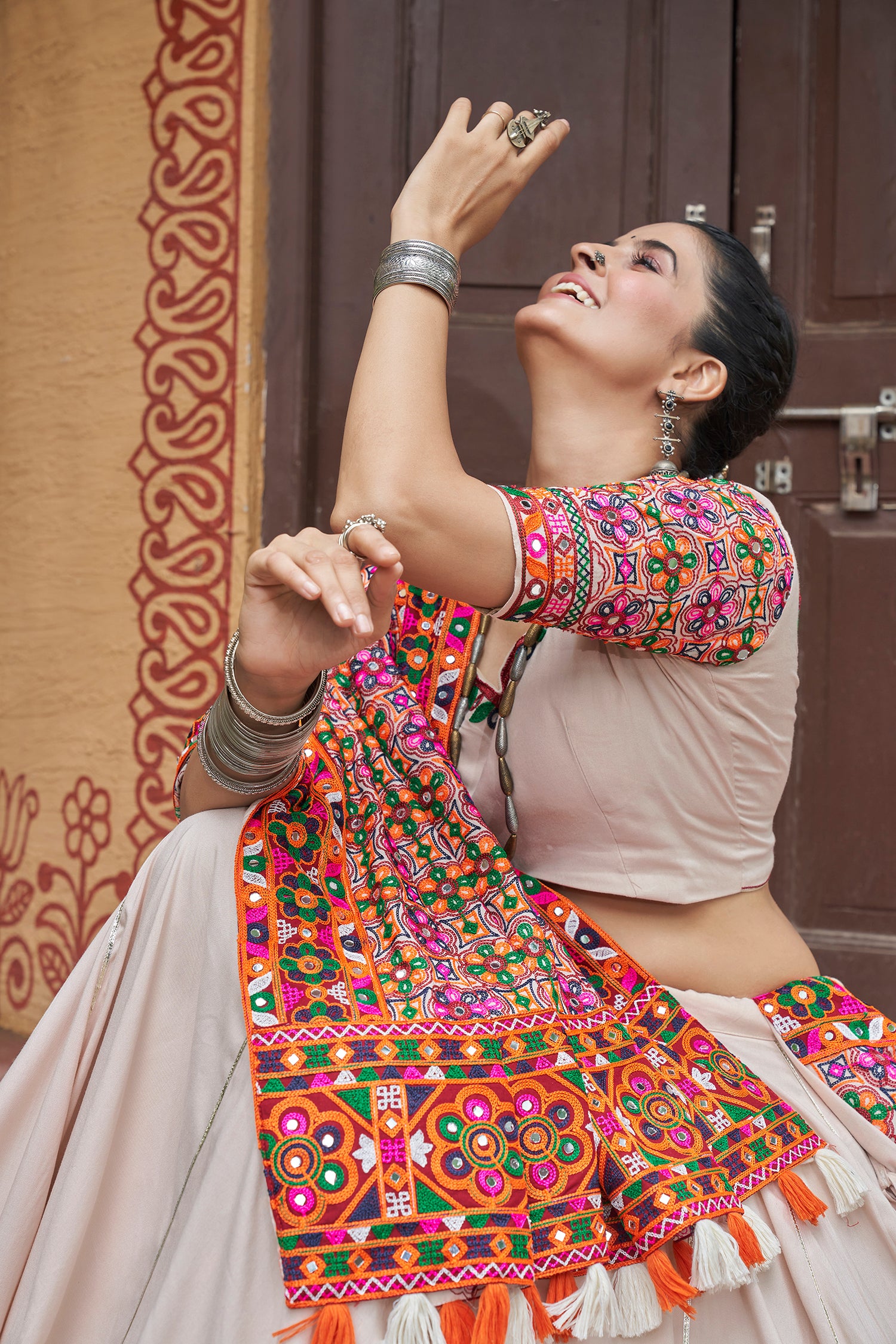 Kutchi work dupatta with white lehenga

