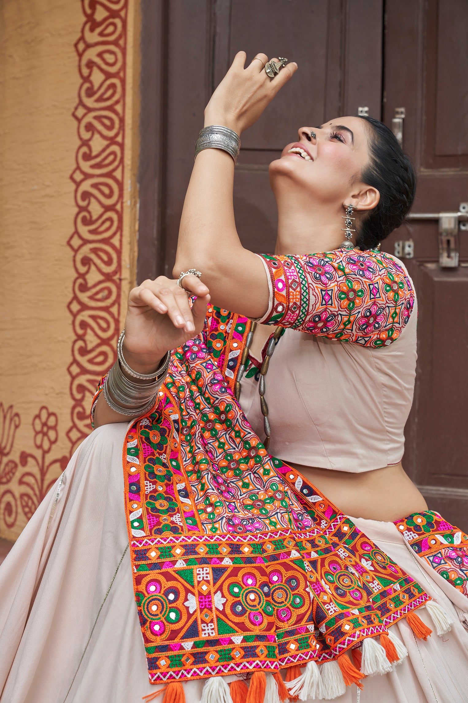 Kutchi work dupatta with white lehenga

