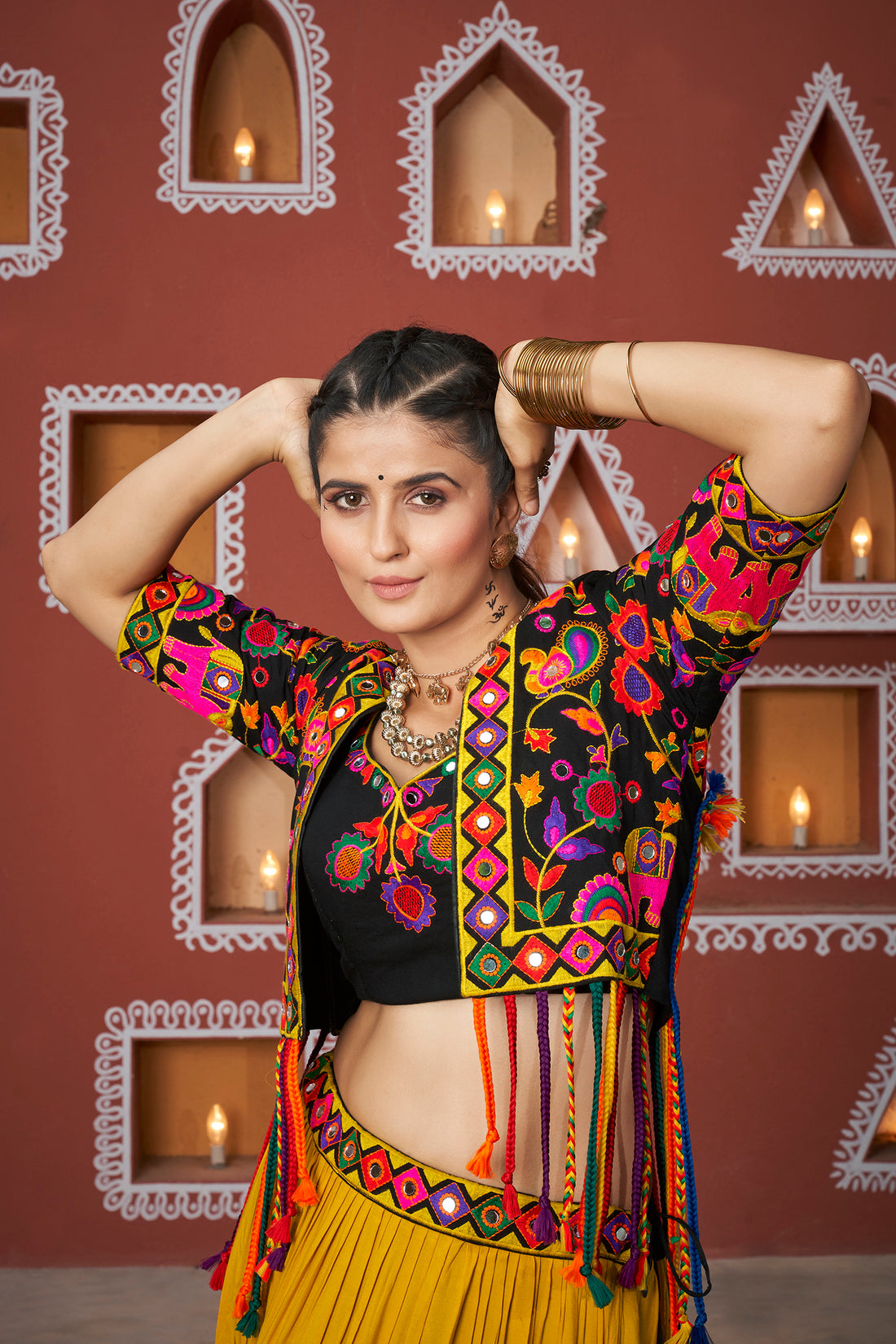Mustard and black tiered Chaniya Choli with floral embroidered jacket

