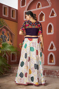Model in white Navratri Chaniya Choli twirling during Dandiya

