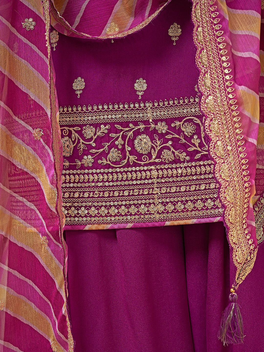 Embroidered magenta sharara suit with round neck kurta and scalloped dupatta