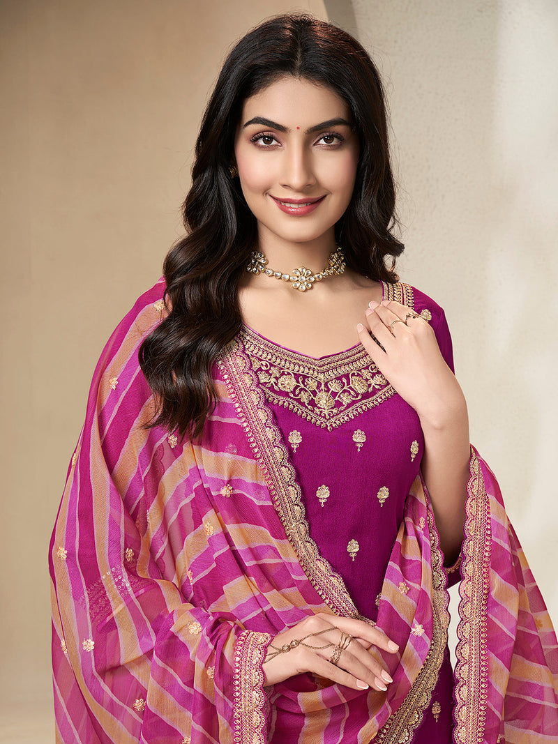 Party wear sharara set in magenta with printed dupatta and tassels