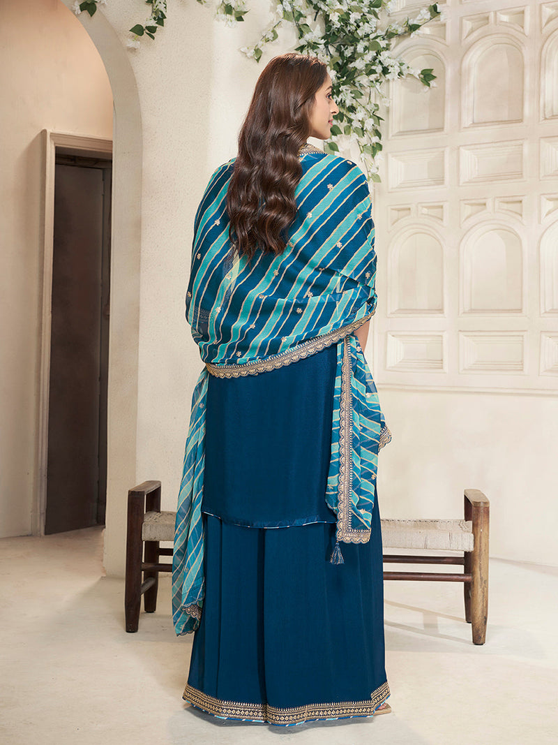Elegant teal sharara suit with sequin border and tassels