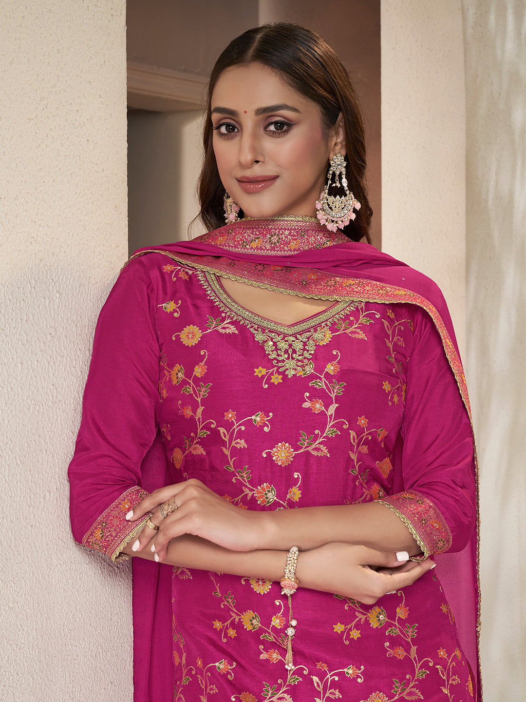 Dola silk V-neck kurta and Chinon sharara for festive wear