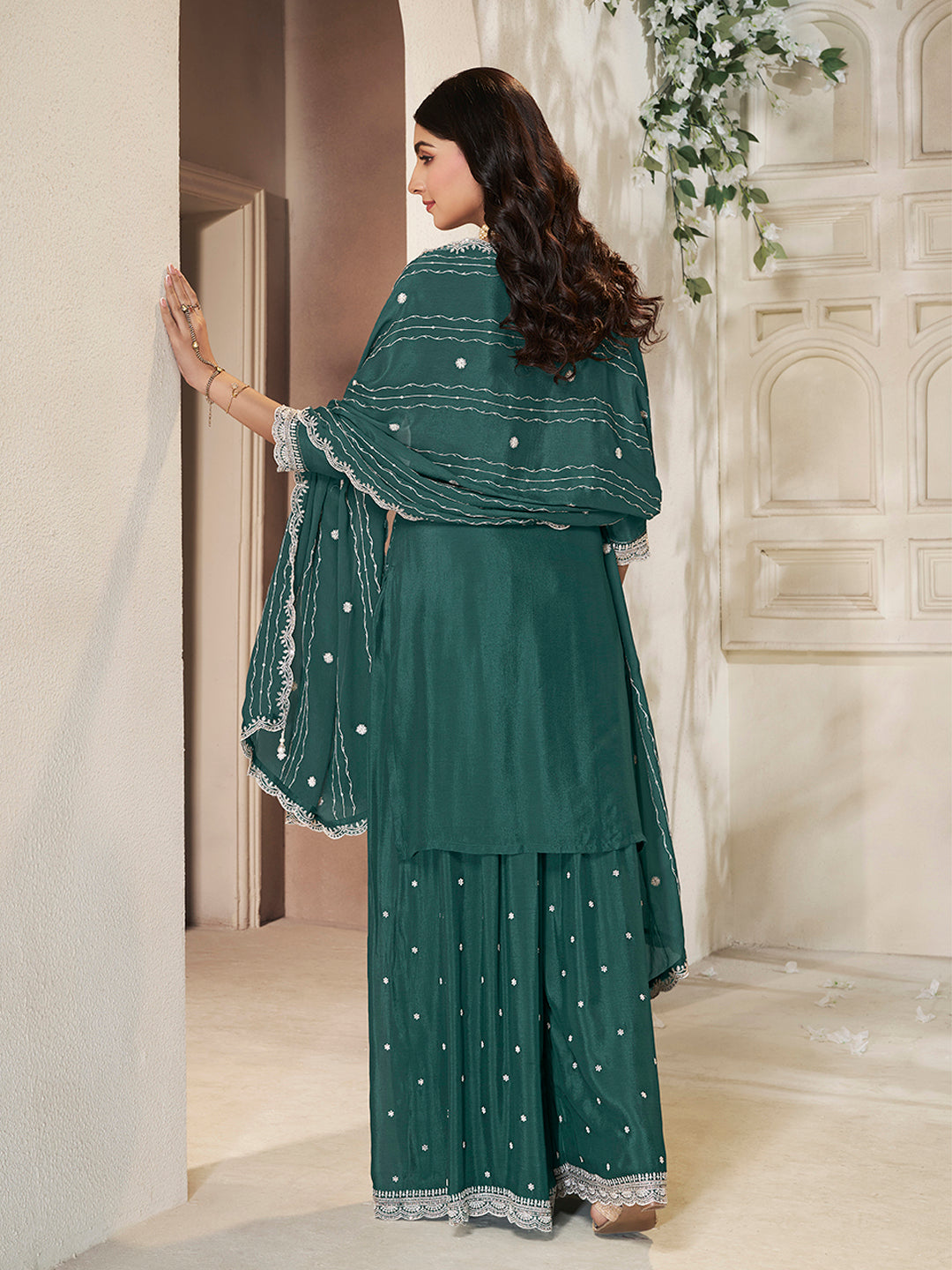 Green festive wear sharara outfit with scalloped dupatta
