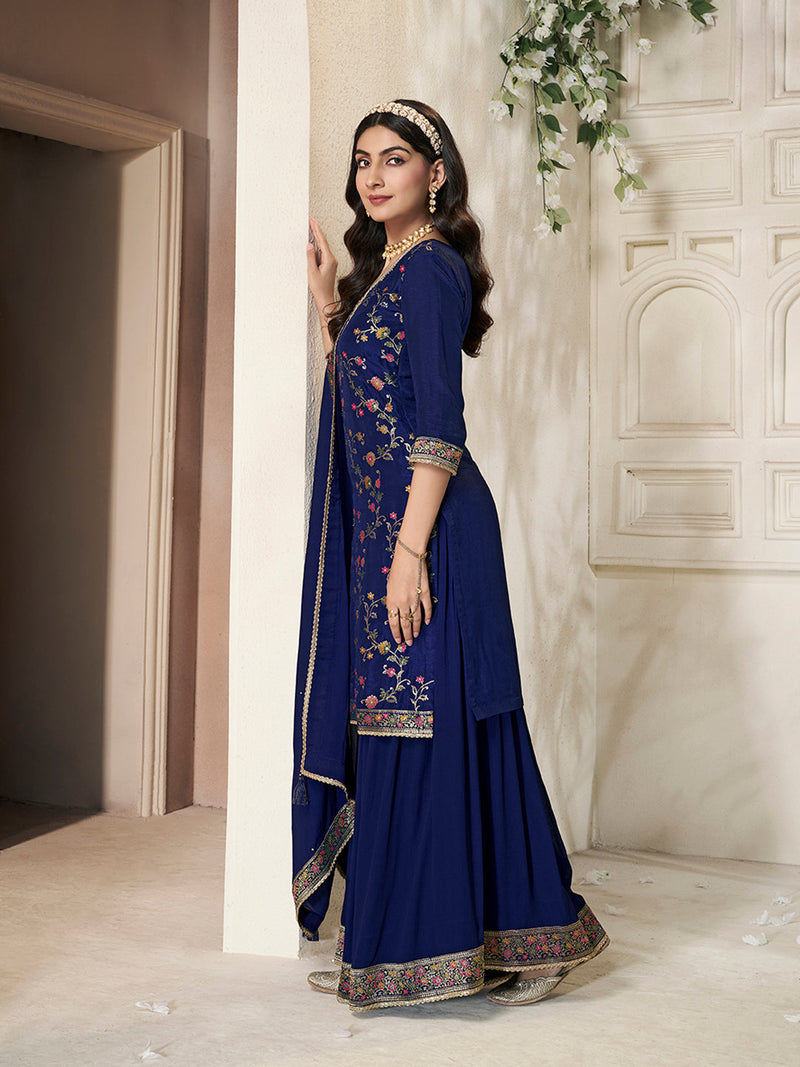 Elegant navy blue sharara set with floral motifs and Chinon dupatta