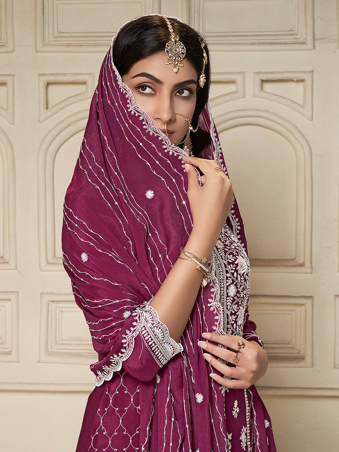 Magenta ethnic suit with scalloped dupatta and thread work