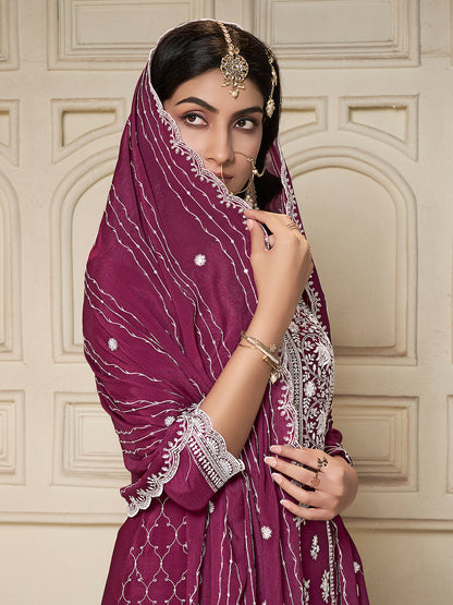 Magenta ethnic suit with scalloped dupatta and thread work