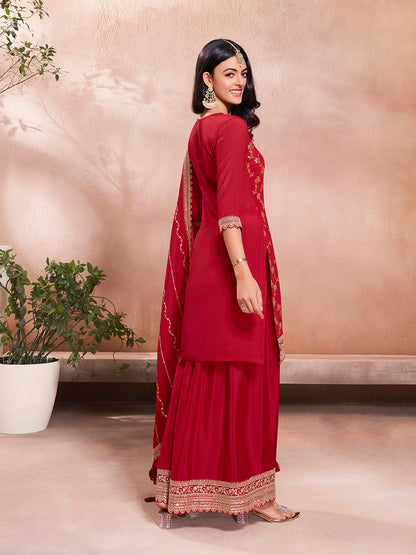 Elegant red ethnic suit set with embroidered dupatta and sharara