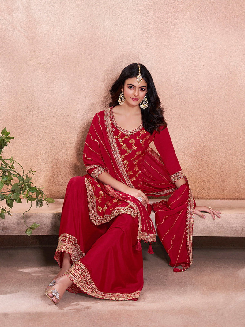Traditional red sharara suit with embroidery for festive occasions