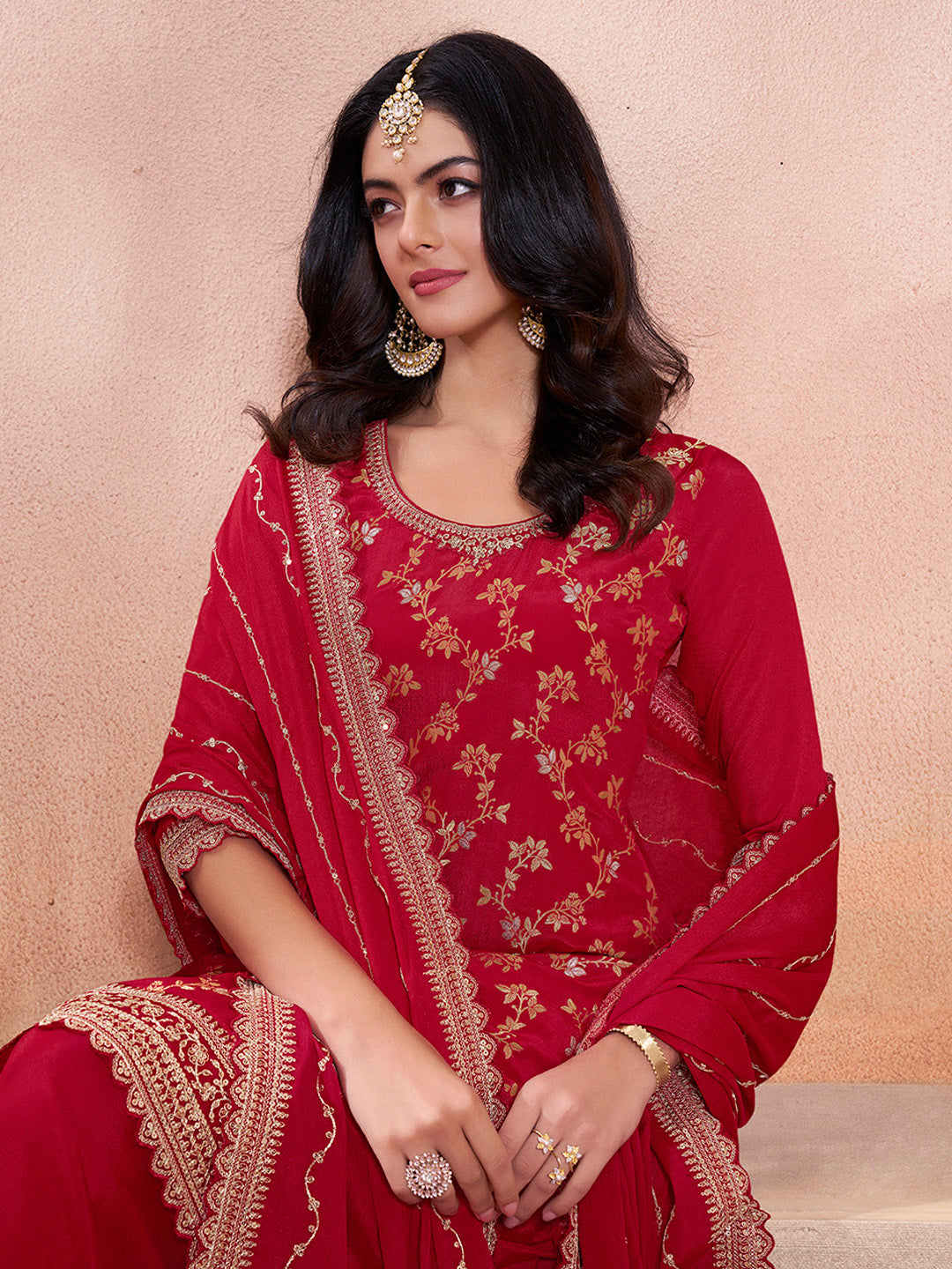 Red embroidered sharara suit with floral jaal and scalloped dupatta