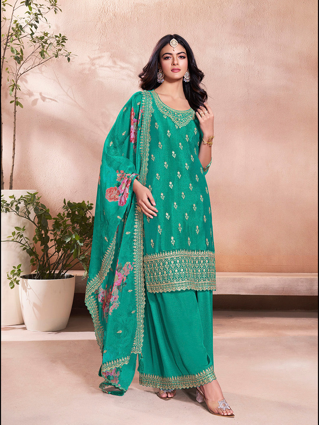 Wedding wear sharara dress in teal green with heavy embroidery