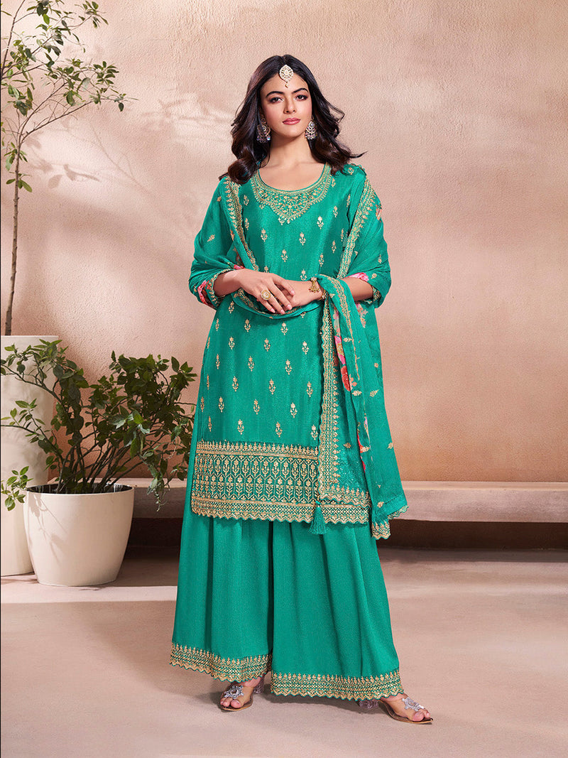 Teal green embroidered sharara suit with floral printed dupatta