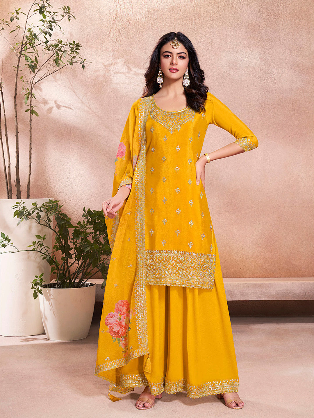 Mustard yellow sharara suit with sequin embroidery and floral dupatta