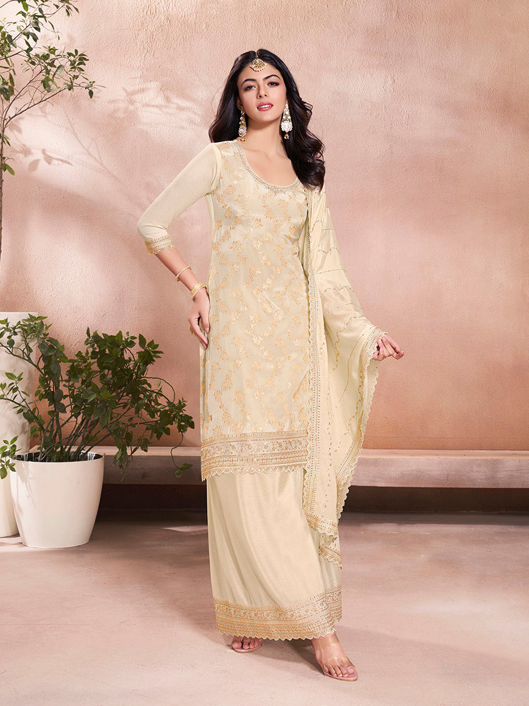 Beige embroidered sharara suit with floral jaal and scalloped dupatta