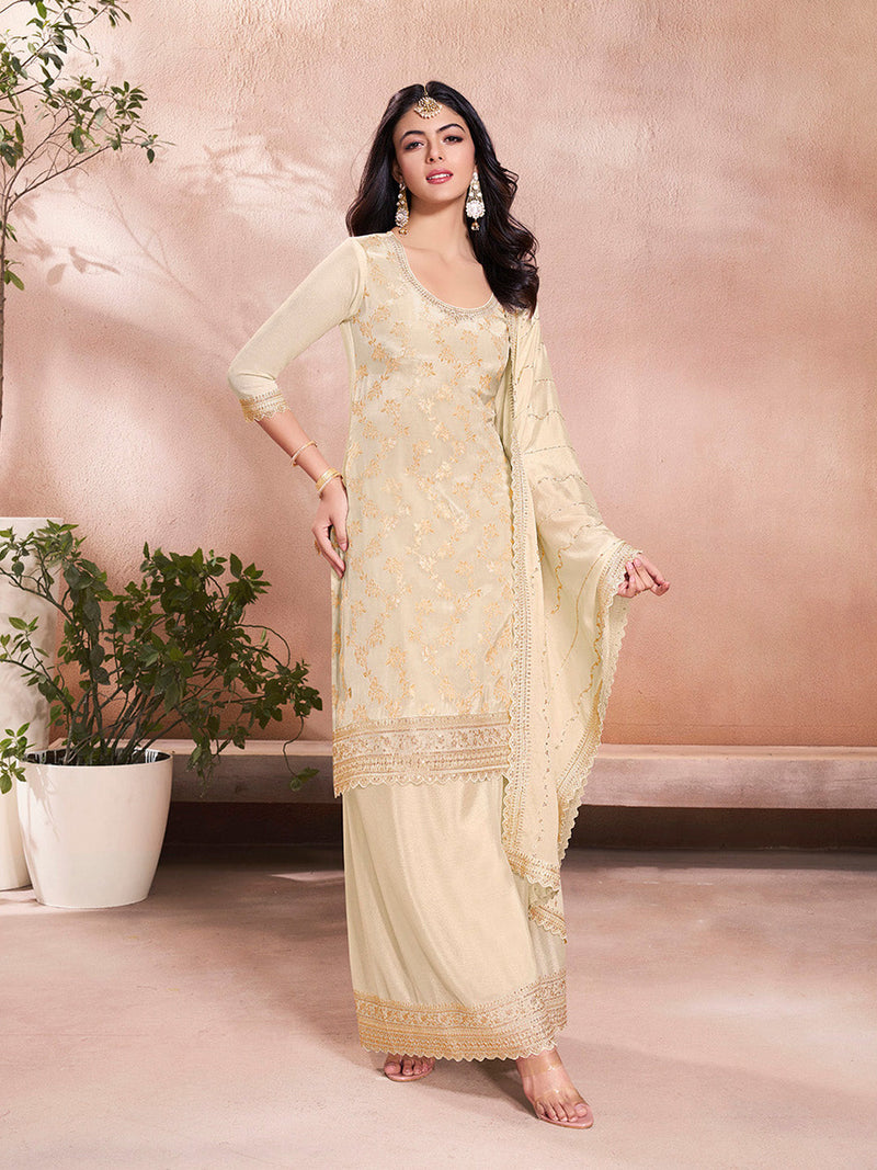 Beige embroidered sharara suit with floral jaal and scalloped dupatta