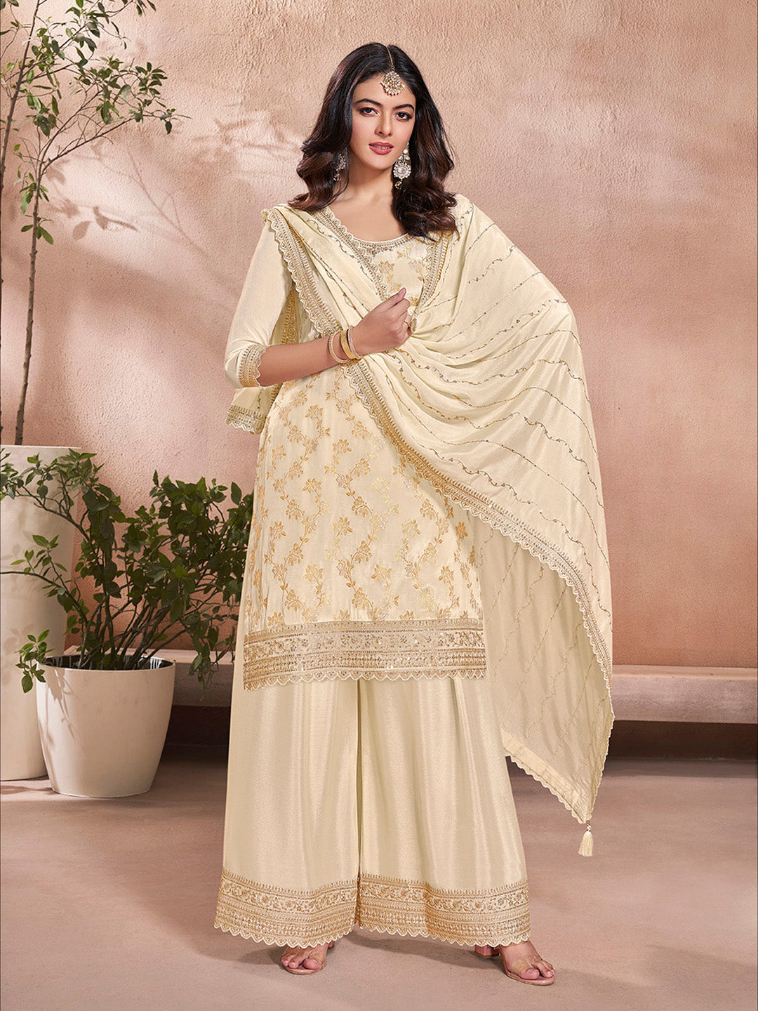 Elegant beige ethnic sharara dress with embroidered kurta and bottom