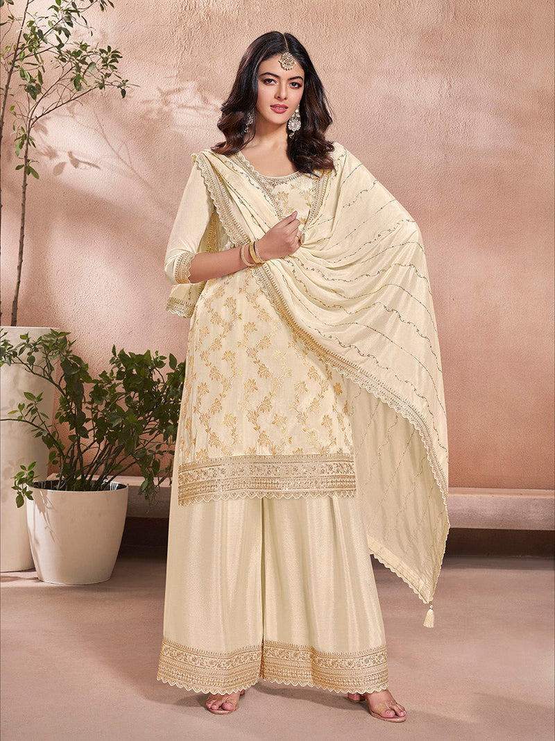 Elegant beige ethnic sharara dress with embroidered kurta and bottom