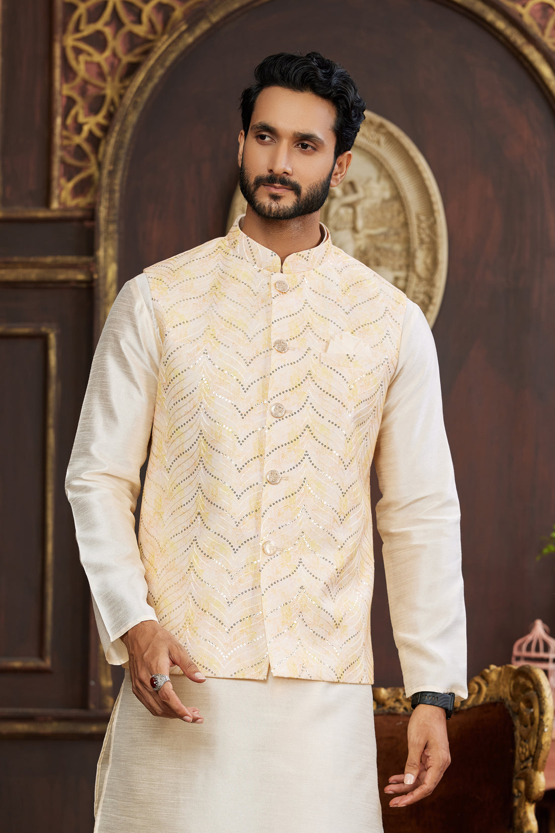 Cream peach kurta pajama set with printed jacket for men