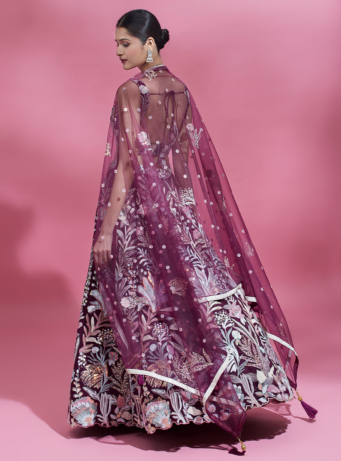 Burgundy net lehenga with thread embroidery

