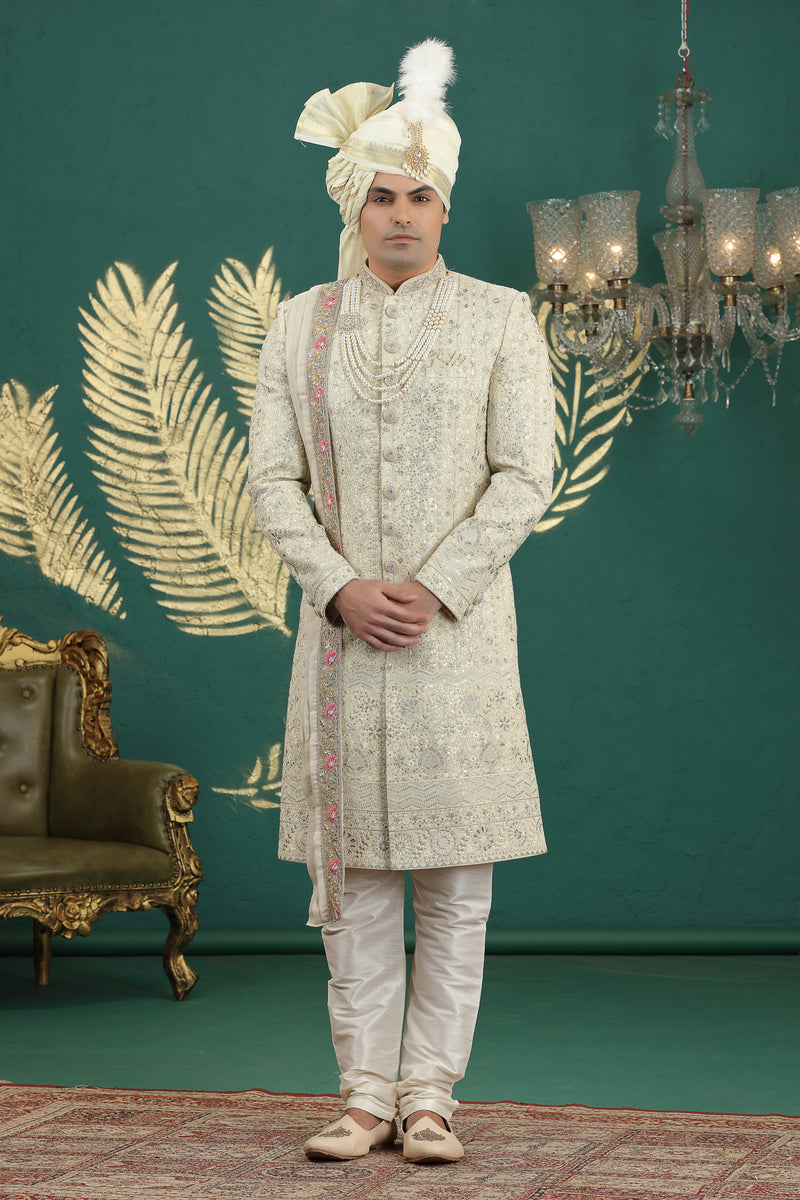 Groom ivory sherwani with computer thread work