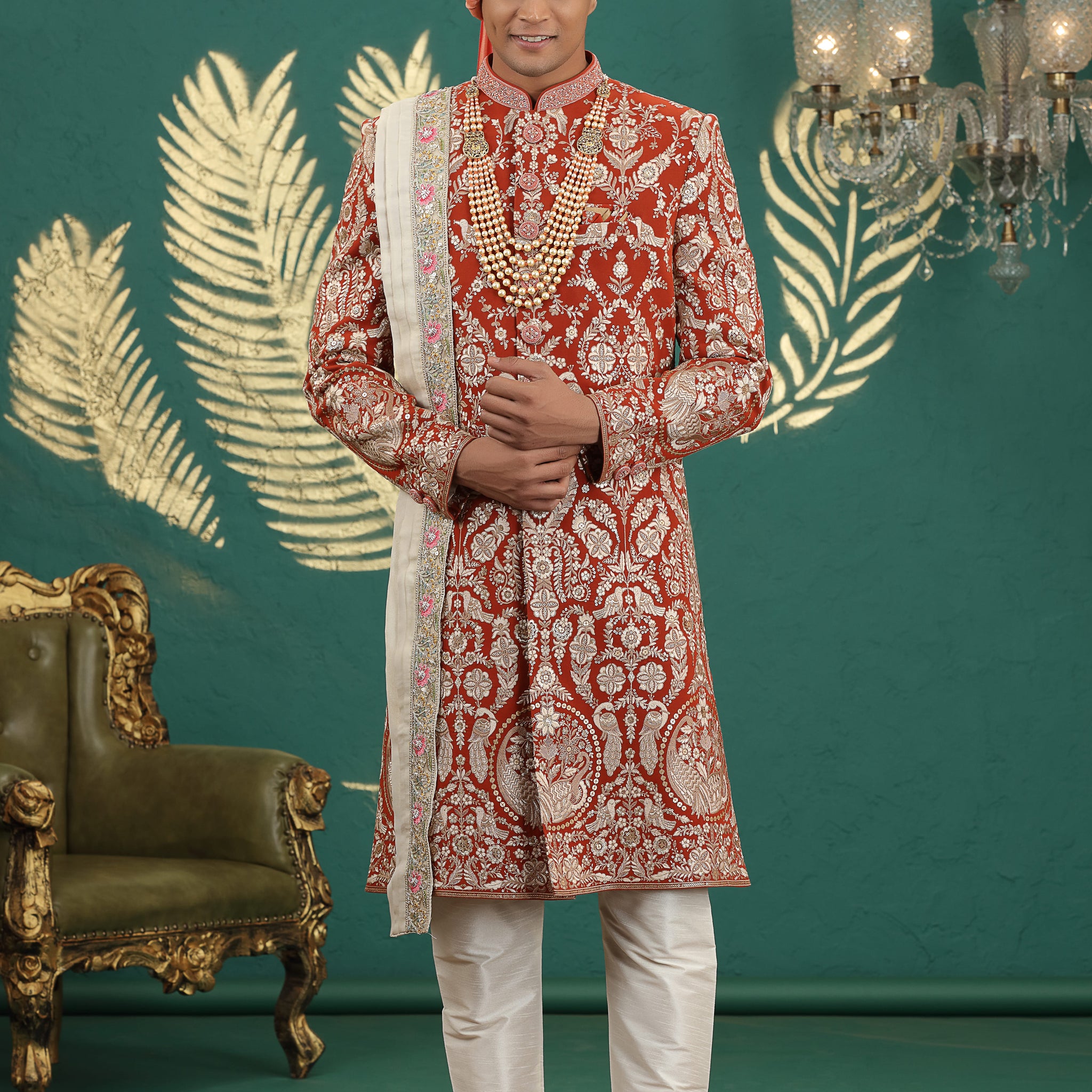 Red embroidered wedding sherwani for groom