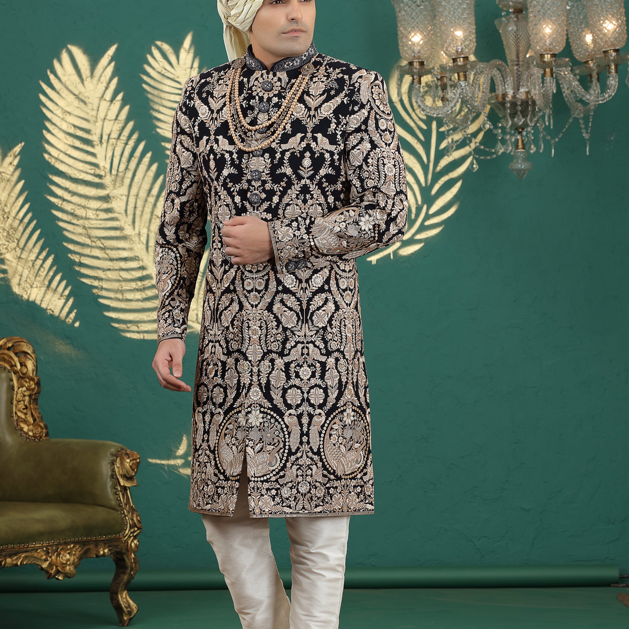 Black art silk sherwani with golden embroidery for groom