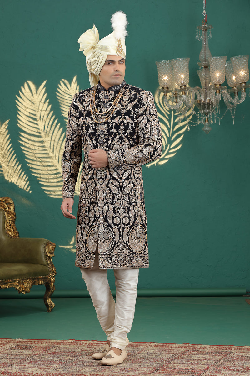 Black art silk sherwani with golden embroidery for groom