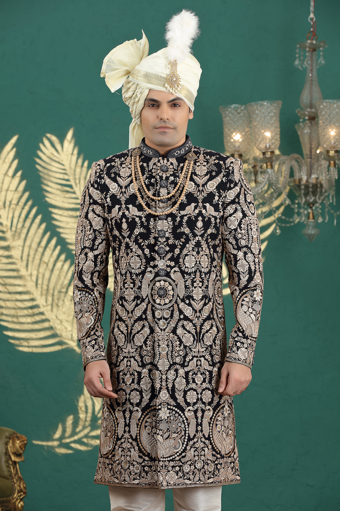 Black art silk sherwani with golden embroidery for groom