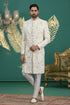 Cream art silk sherwani with hand embroidery for groom