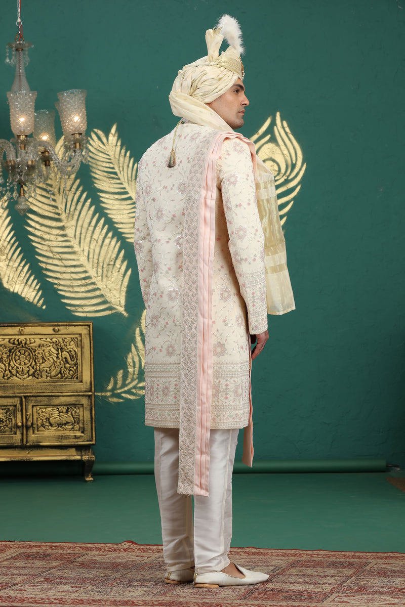 Traditional gold sherwani outfit for Indian wedding groom