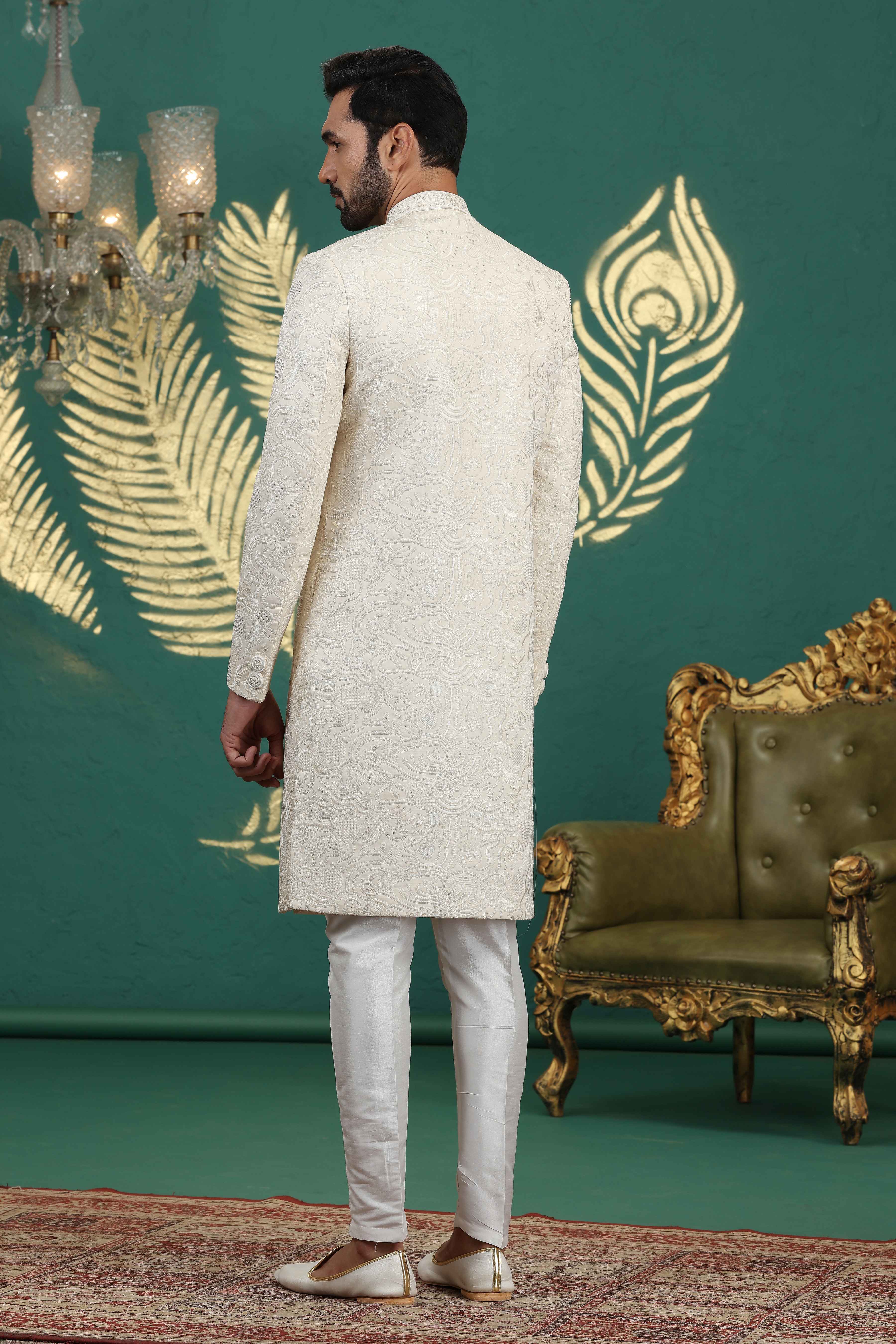 Traditional cream groom sherwani with embroidery
