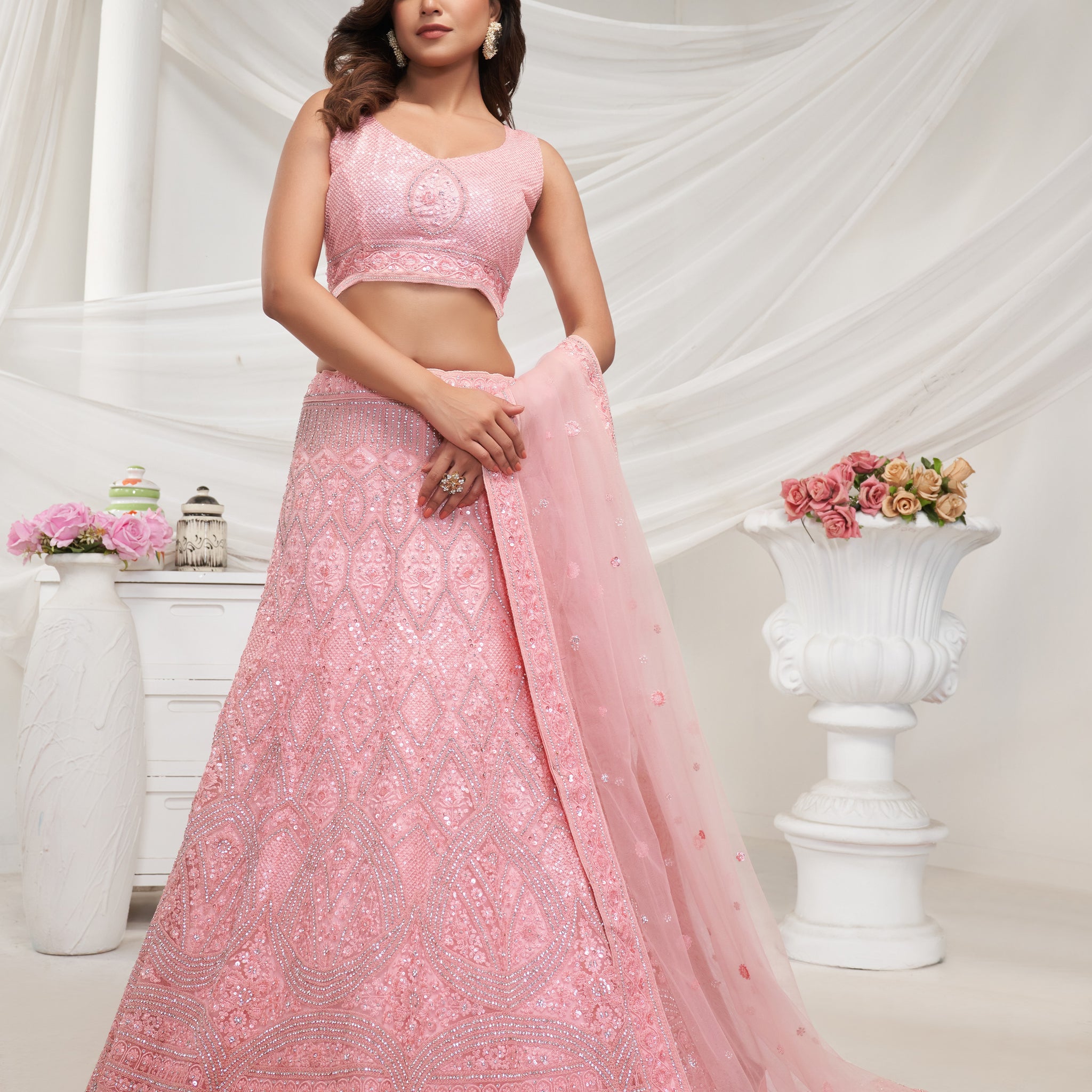 Elegant Pink Soft Net Lehenga Choli with Geometric Rhinestone Work