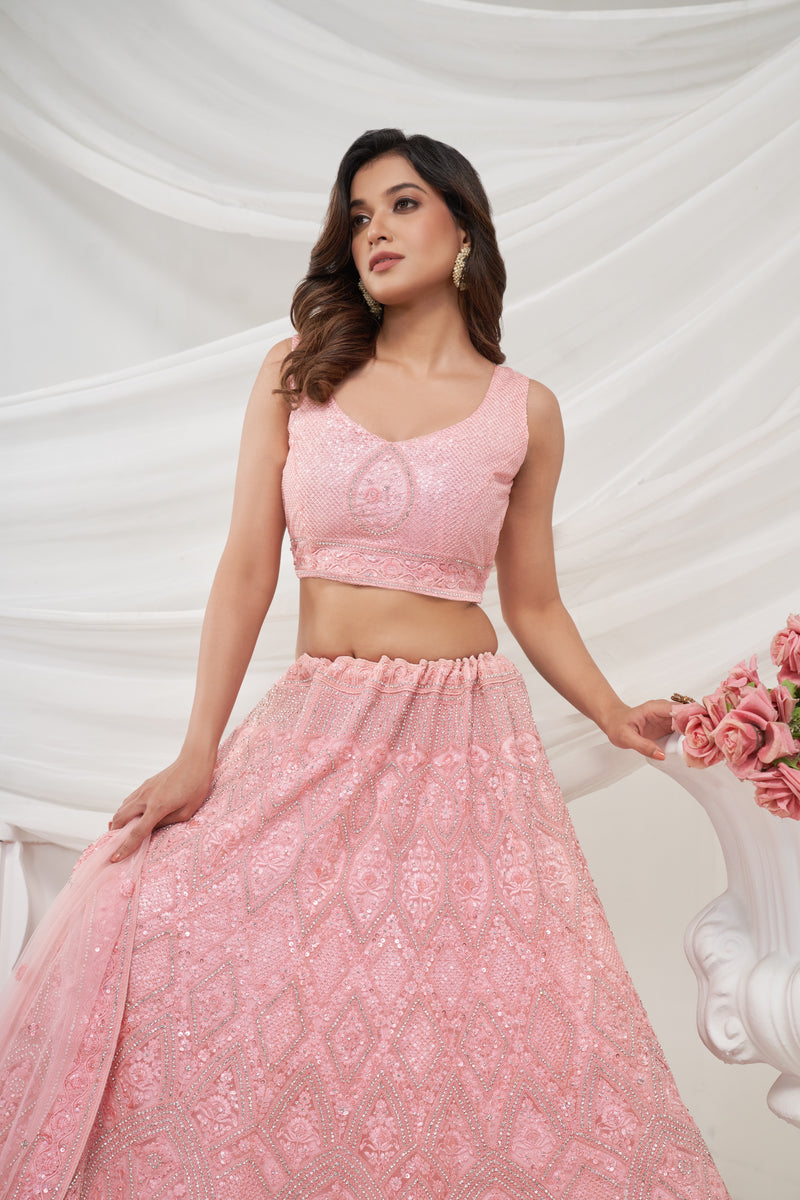 Elegant Pink Soft Net Lehenga Choli with Geometric Rhinestone Work