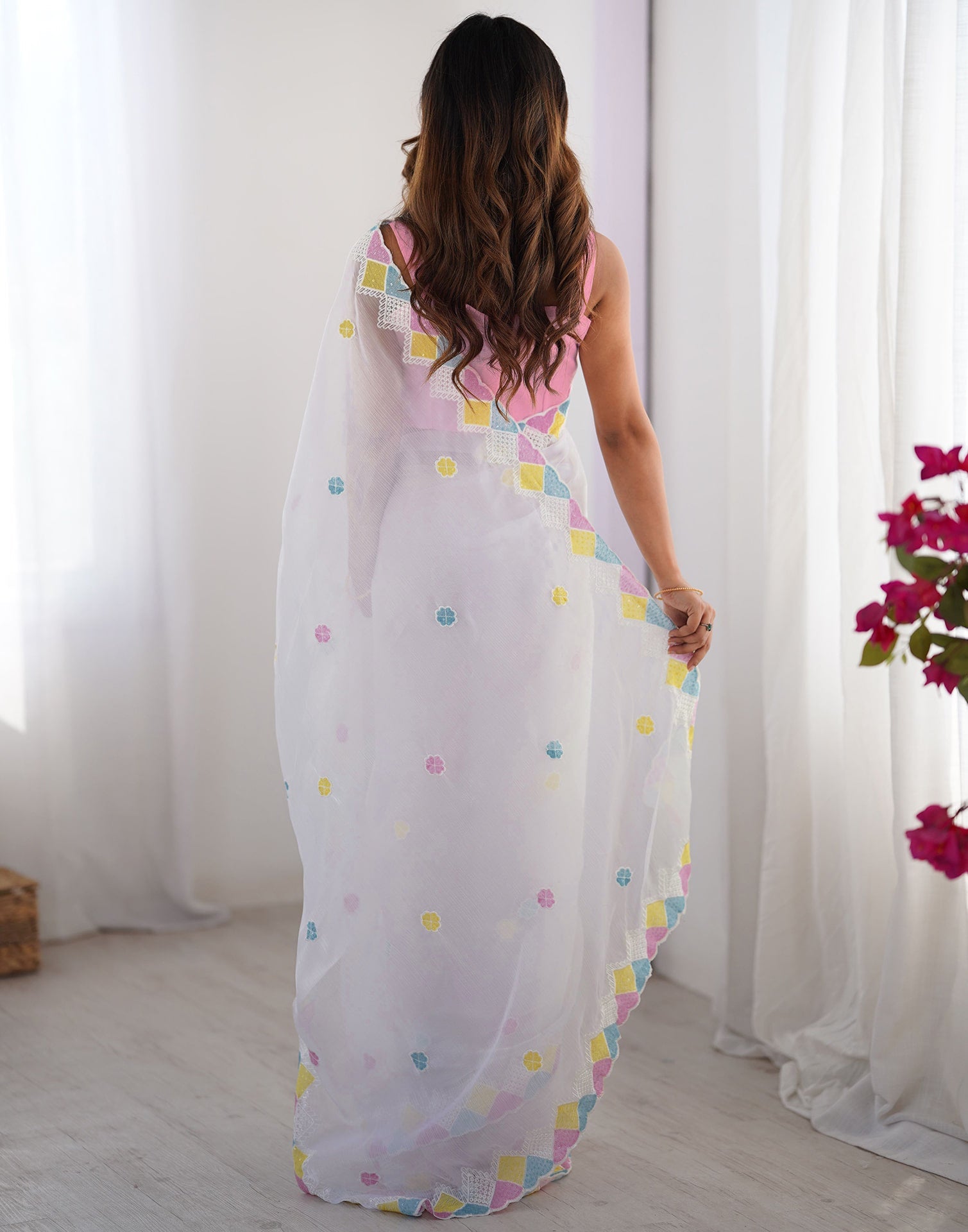 Back View of White Jimmy Choo Saree