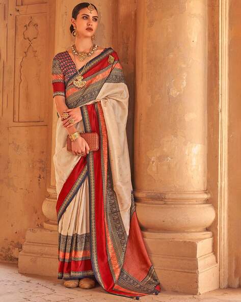 Cream Patola Silk Traditional Woven Saree 