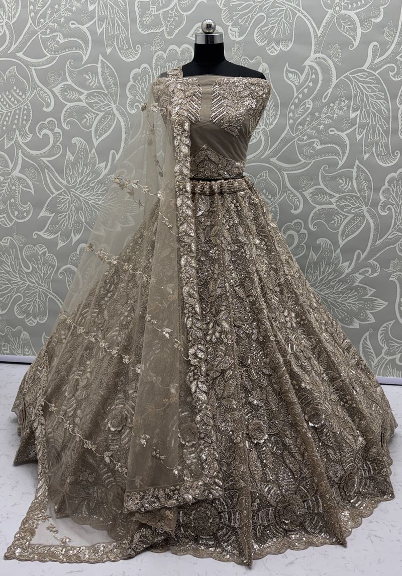 Chiku Pure Soft Net Heavy Embroidery Work Bridal Lehenga