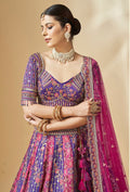 Designer wedding lehenga choli in pink and purple with net dupatta
