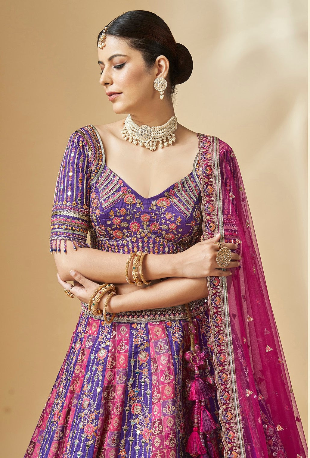 Designer wedding lehenga choli in pink and purple with net dupatta
