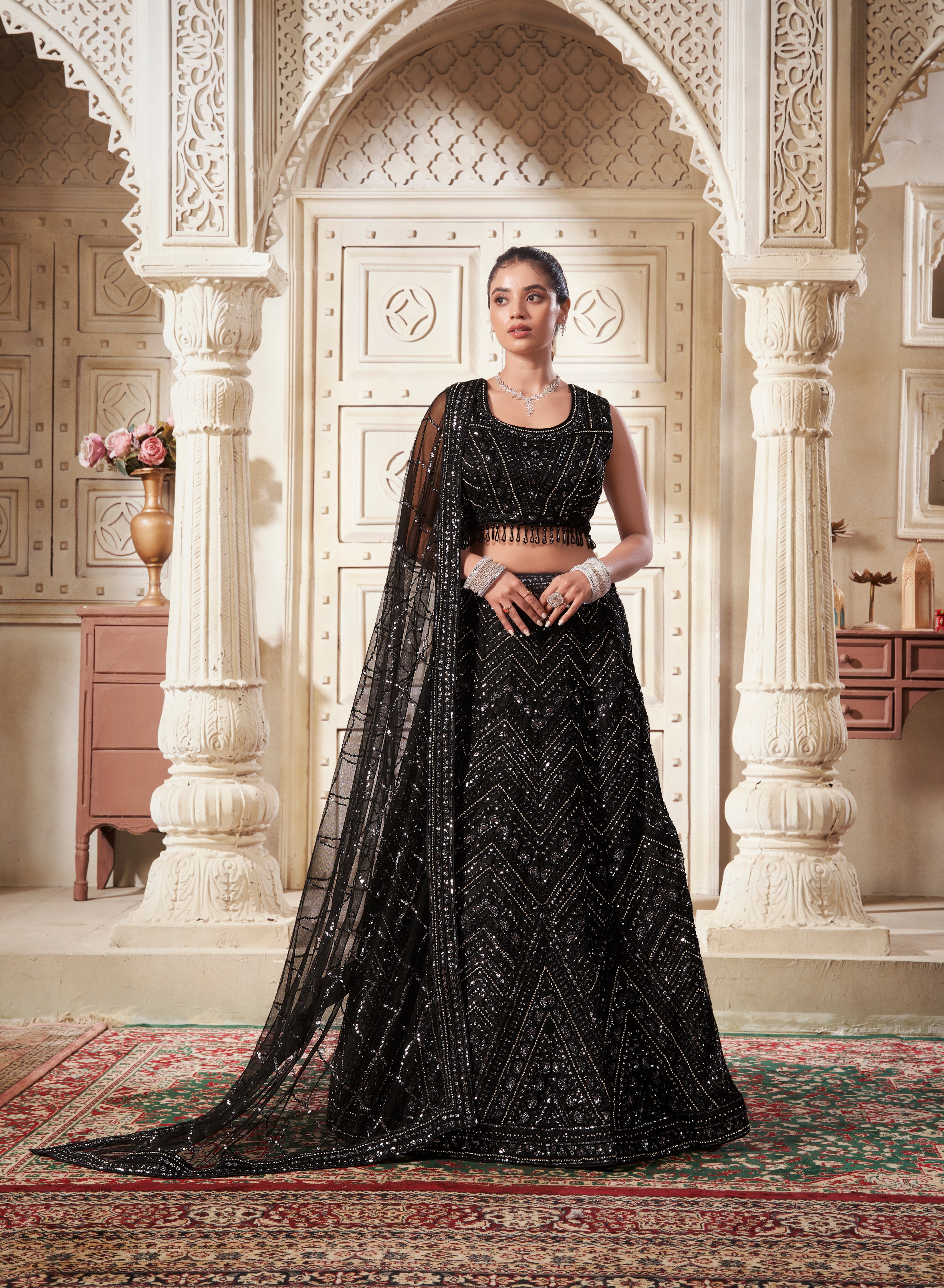 Blossom Black Net Lehenga Choli with Heavy Zarkan and Sequins Work