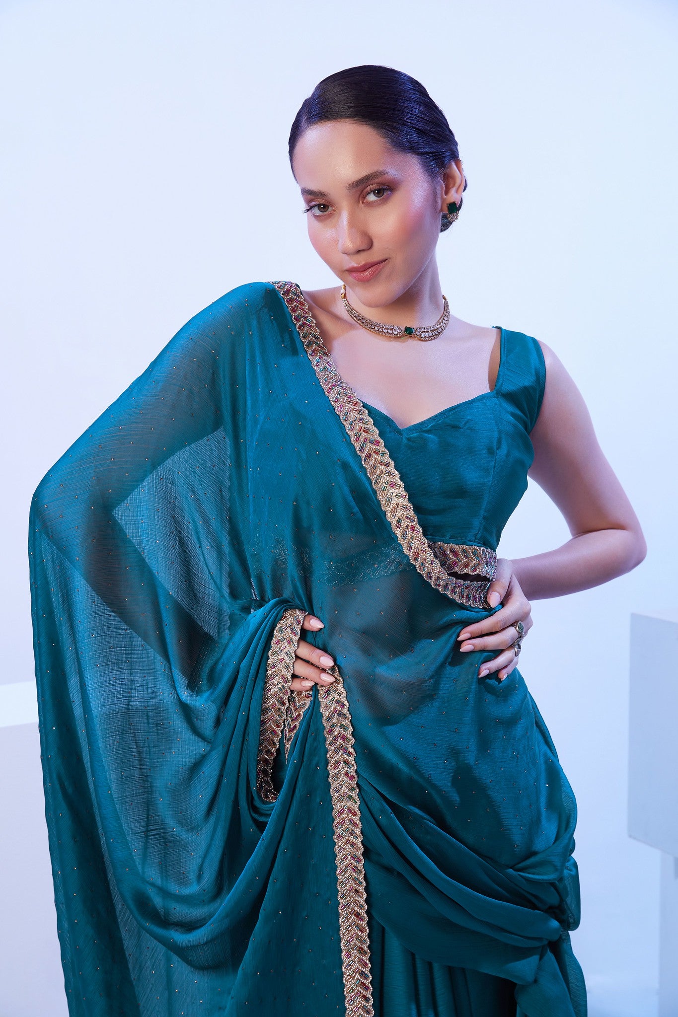 Blue satin saree with gold lace