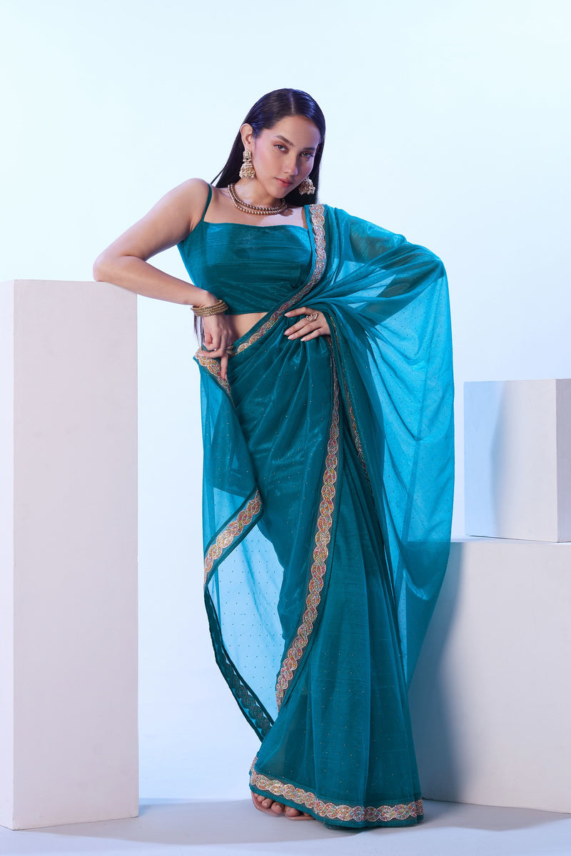 Teal wedding saree with lace border