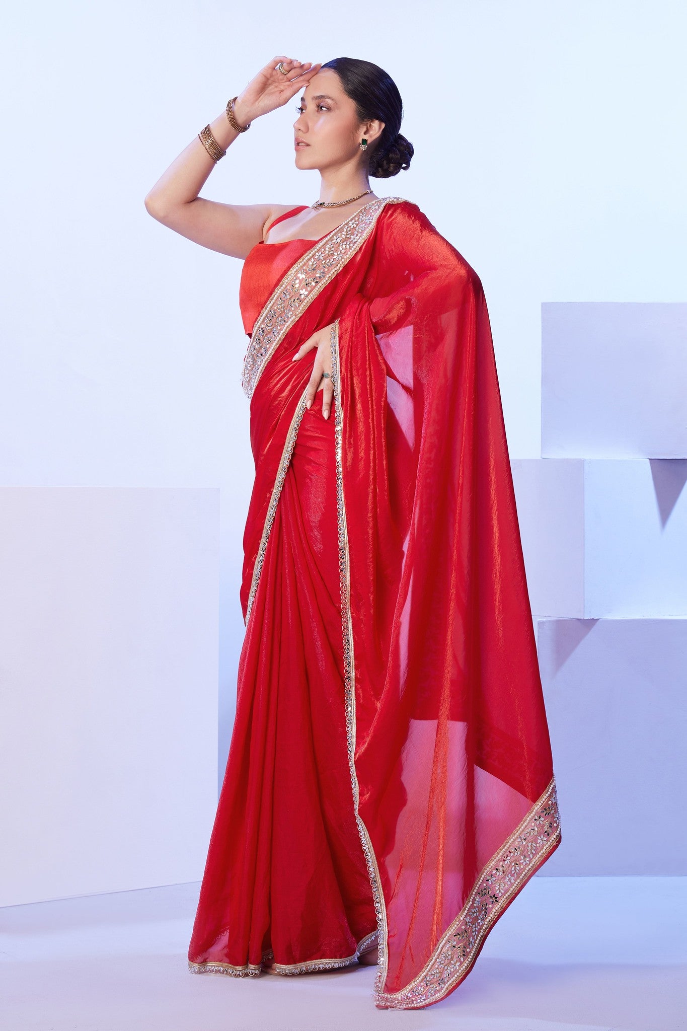 Designer red bridal saree in jimmy choo 