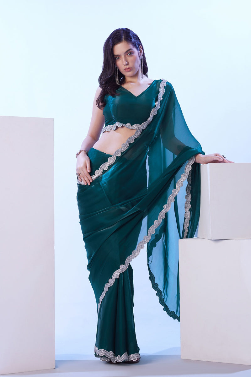 Teal wedding saree with lace border