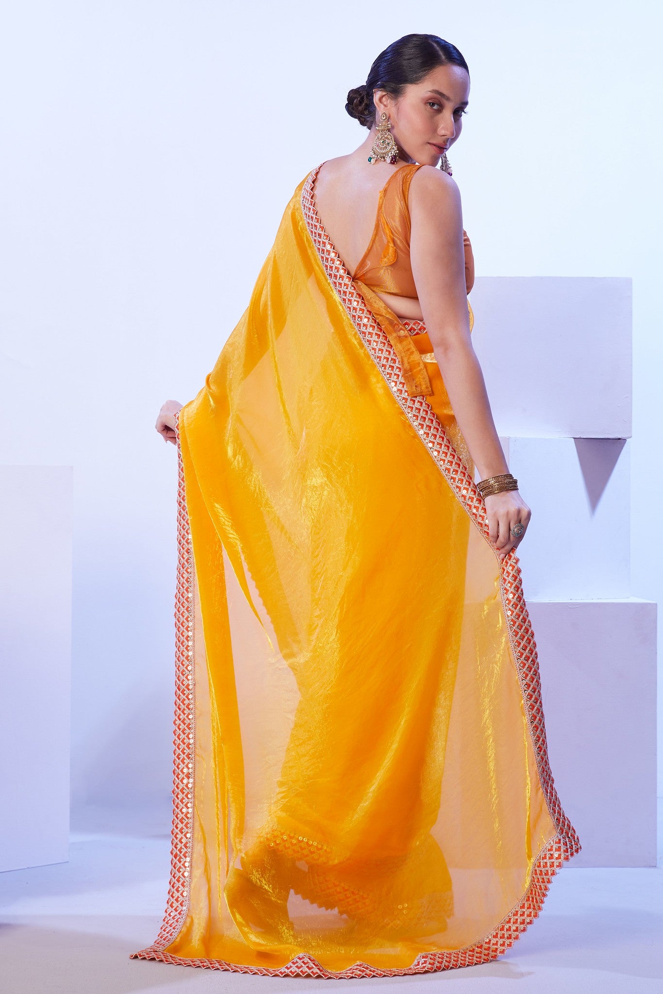 Glossy jimmy choo yellow saree with lace border