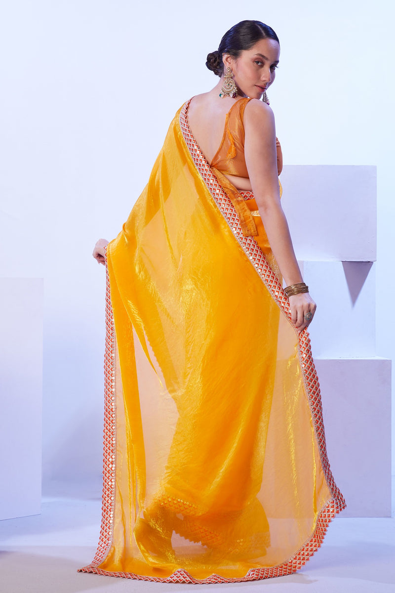 Glossy jimmy choo yellow saree with lace border