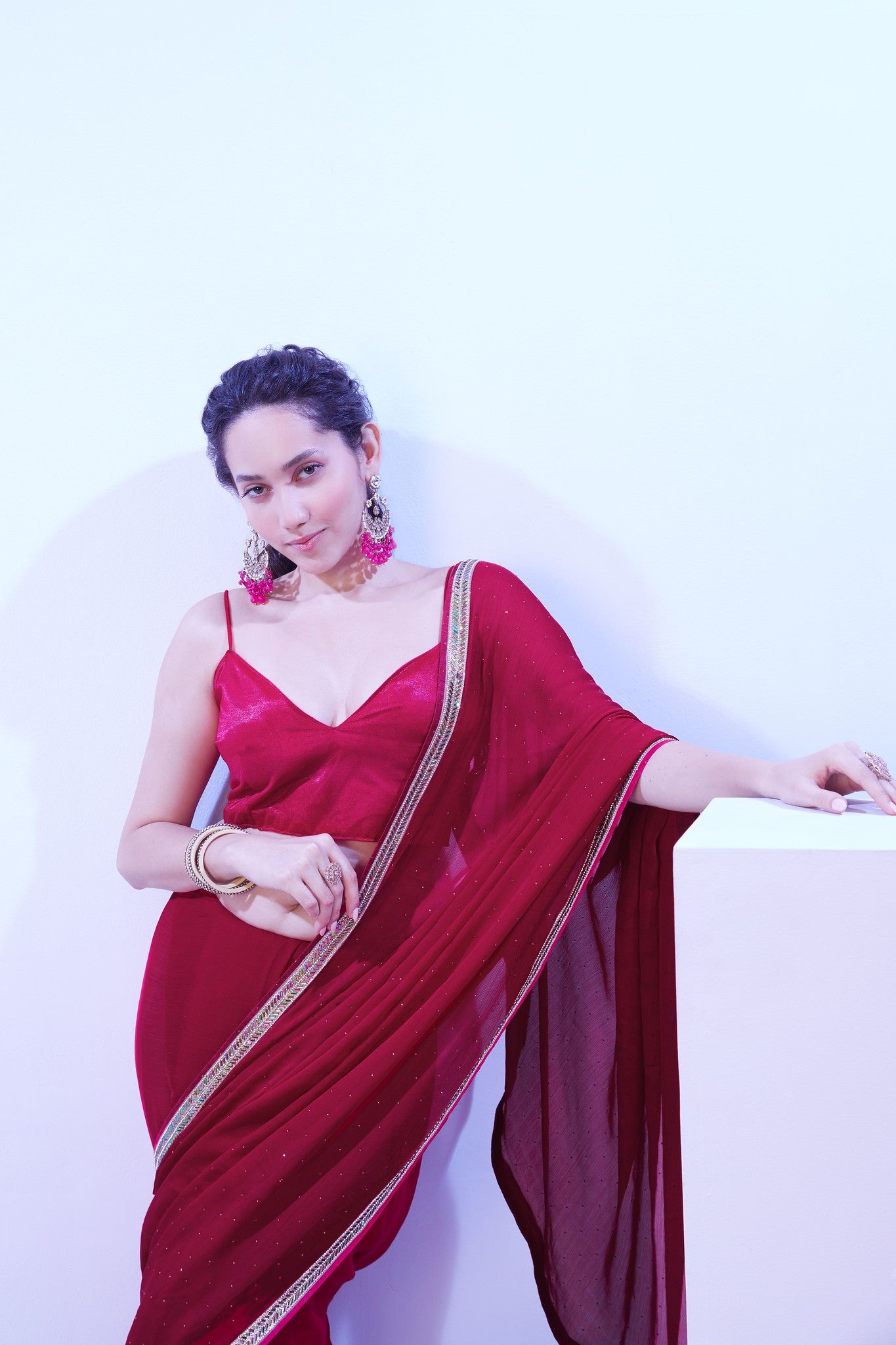 Glossy maroon saree with golden lace