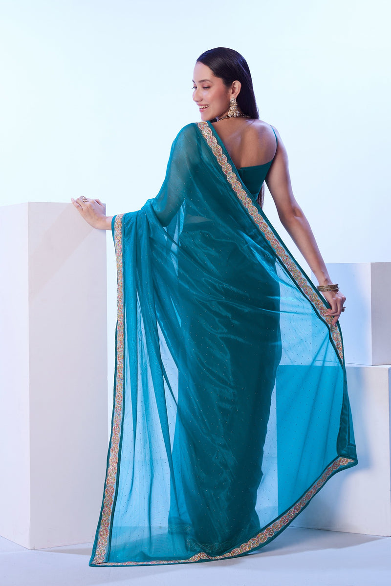 Elegant teal jimmy choo saree for party