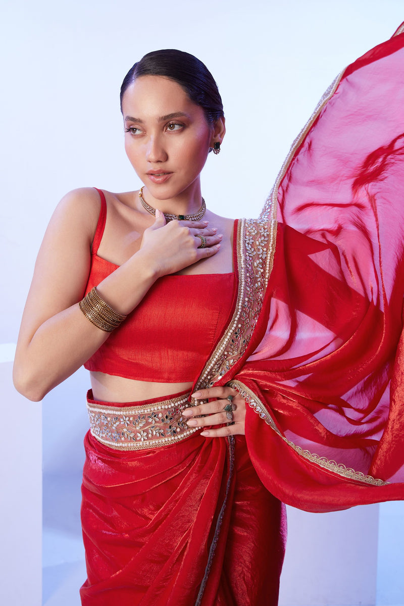 Glossy jimmy choo red saree for wedding