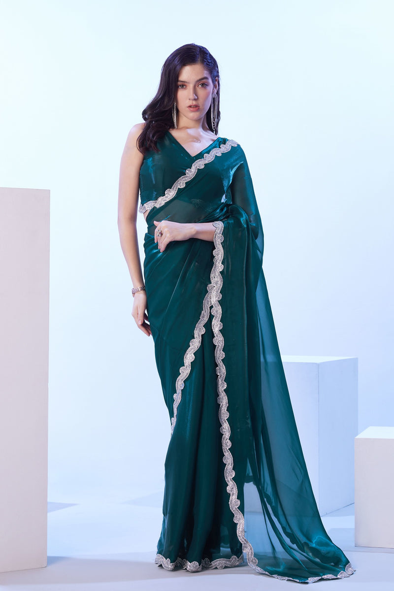 Teal green jimmy choo saree with golden lace